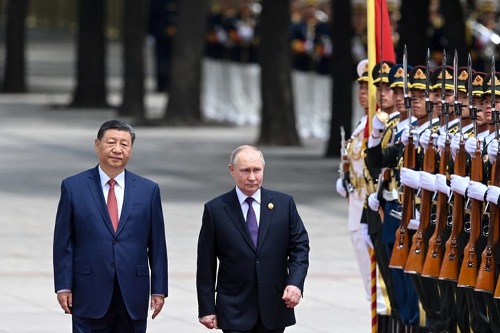 Putin Visits China